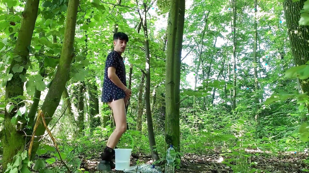 Balls Stretching Outdoor with Bucket Filled with Water and Jerk off