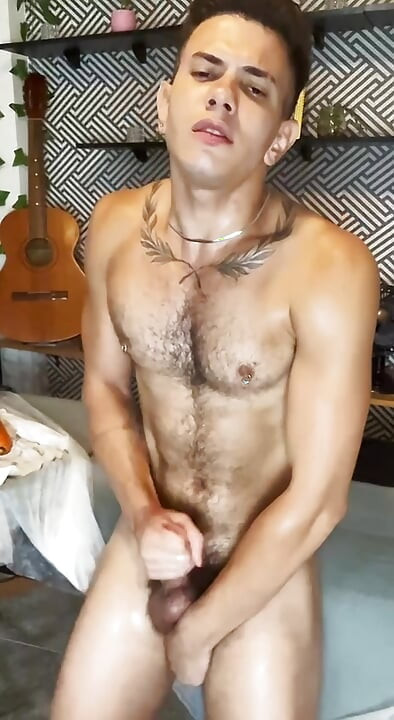 Naughty guy putting the 30 cm cucumber in his ass