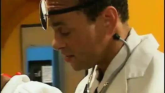 Black nurse in stockings sucks the doctor's dong on her knees