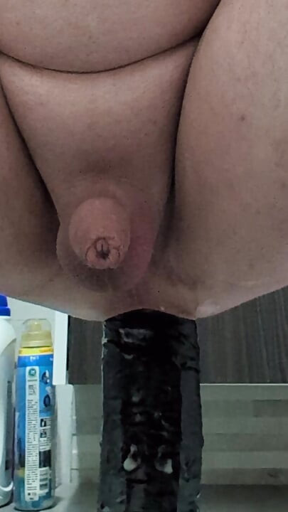 Cumming while ride huge dildos in bathroom