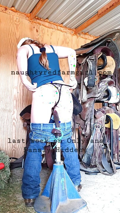Redhead Fucks Herself Like Crazy All Over the Farm