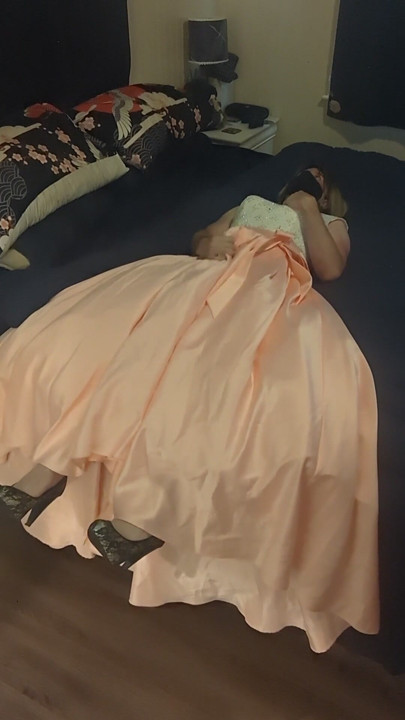 Enjoying a cuteute pink satin prom dress in bed | Clip 1