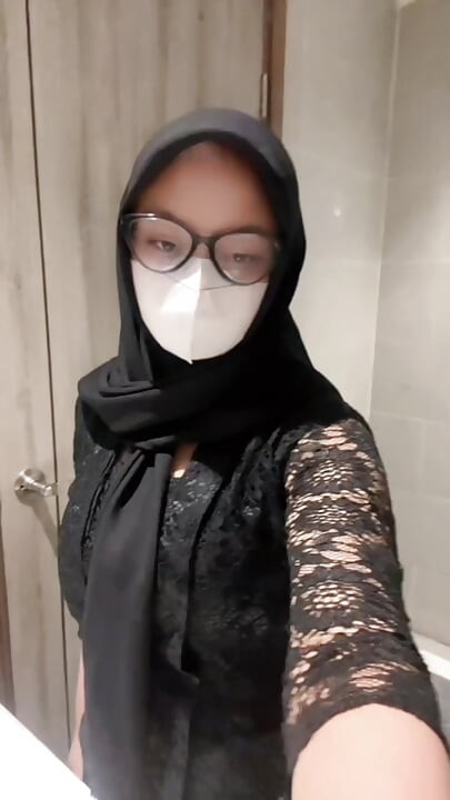 Sexy kebaya hijab playing in the toilet