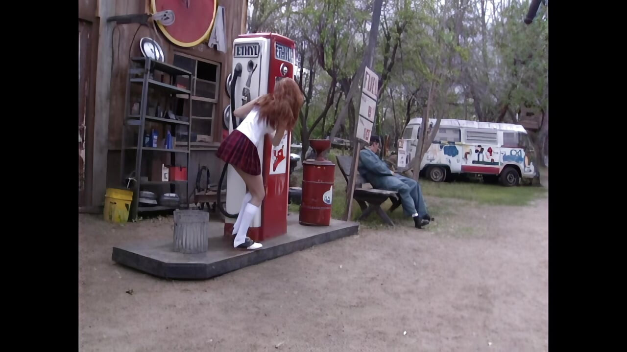 A Young Redhead Eager for Cock Rides Gas Station Attendant's Big Cock