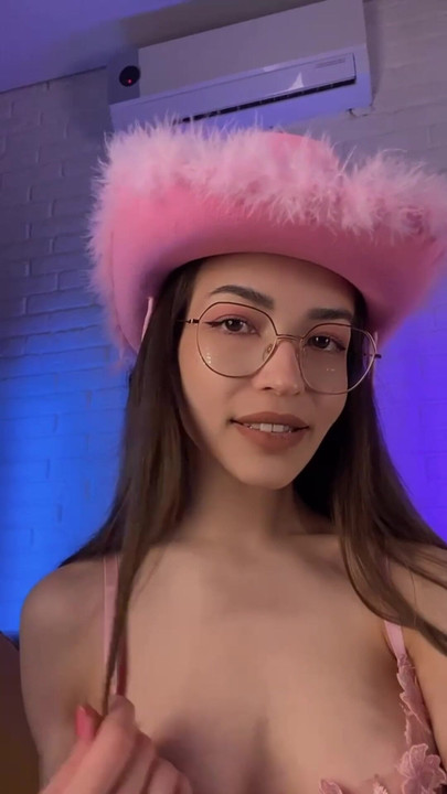 Cowgirl vibes in pink hat and bikini  Ready to ride into your wildest dreams? 🤠