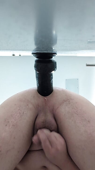 Cumming while ride huge dildos in bathroom