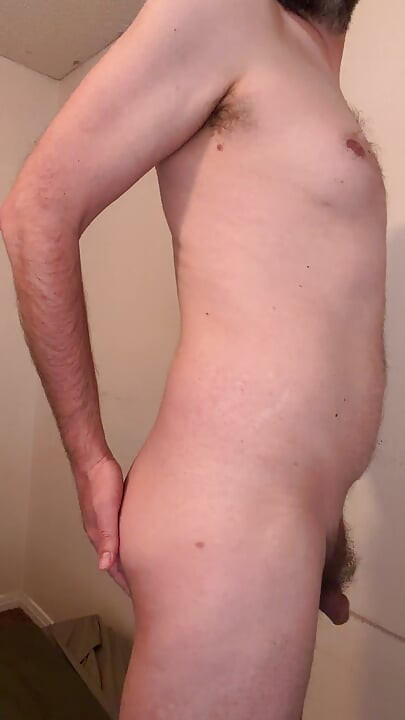Hairy cock dadbod slowly gyrates and plays with bush while standing