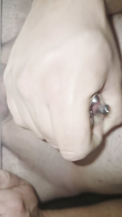 Cum trough piercing hole.