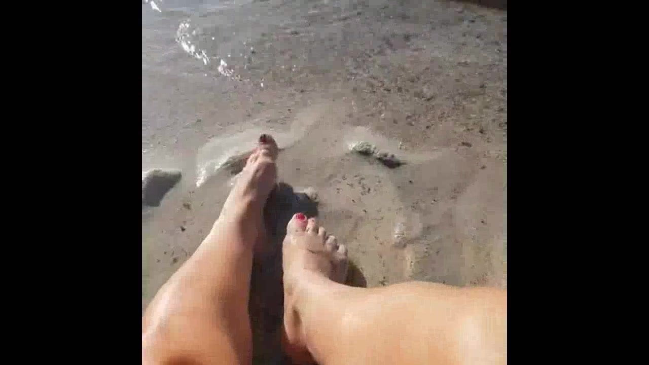 Feet by the sea
