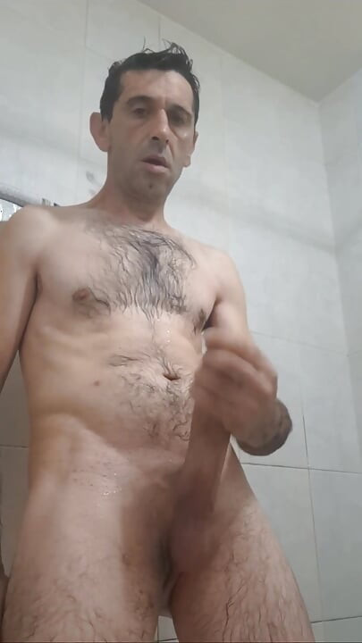 Straight guy with a huge cock jerks off in the shower until he gets all the milk out.