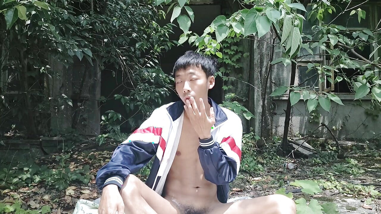 Asian boy spontaneously exposes himself naked in the wild, moans, masturbates, and ejaculates