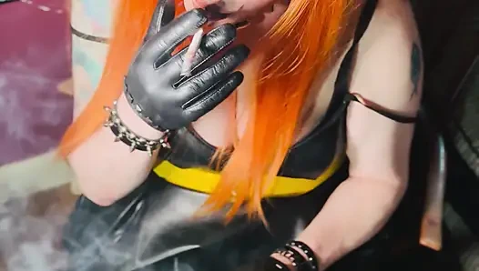 Redhead Tina Snua Smoking 2 Cigarettes At A Time Wearing A Leather Dress & Gloves