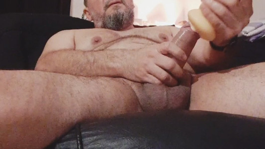 jerking off with masturbation toy