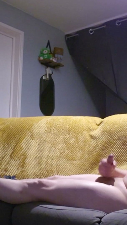 crossdresser layed on sofa playing with her self wearing nothing but her kitten heels and bra | Clip 1