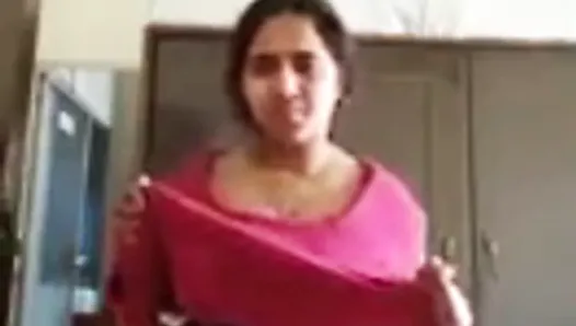 Indian Milf showing her boobs and undressing