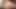 Redhead ladyboy with small boobs strips her jean shorts and