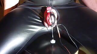 Estim cumload with chastity cage