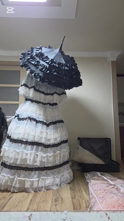 A man dressed as a woman wore a dress.