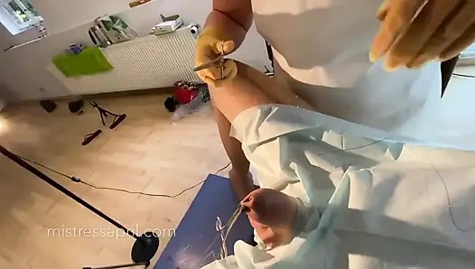 Dominatrix mistress April - clinical cock sewing