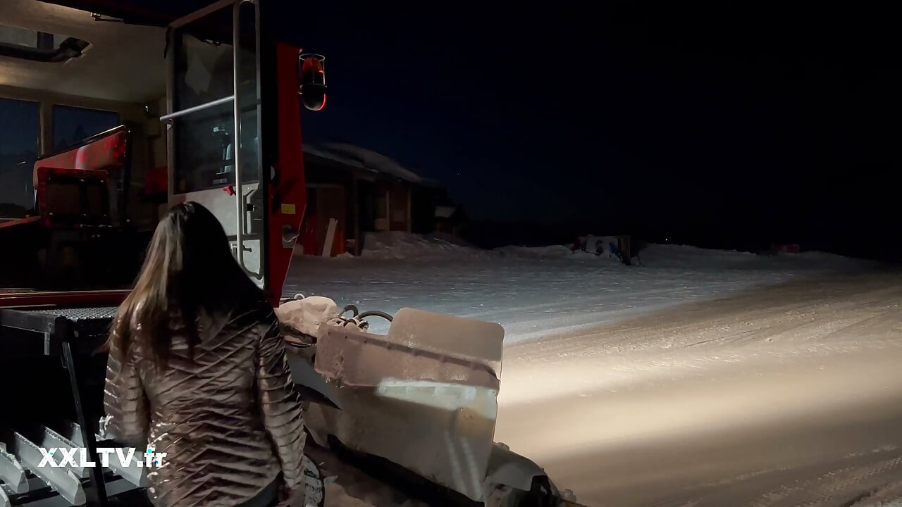 Nighttime ski slope threesome