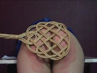asian gets the carpet-beater