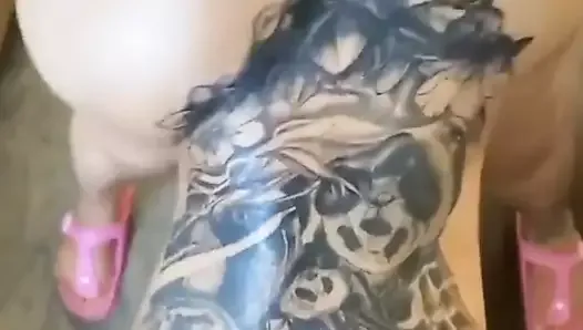 Tatted ebony shaking her huge ass.