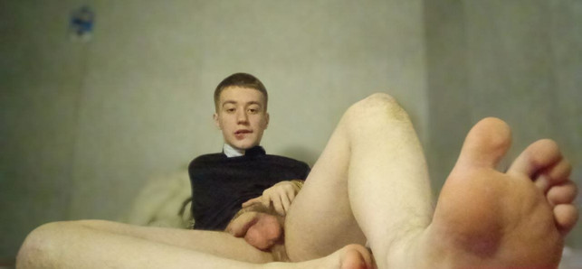 Handsome gay amateur priest with a huge cock masturbates and spanks his big ass and also shows his feet