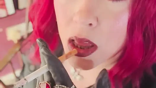 Your Mistress Tina Snua dressed In Leather Chain Smoking 2 Cork Cigarettes