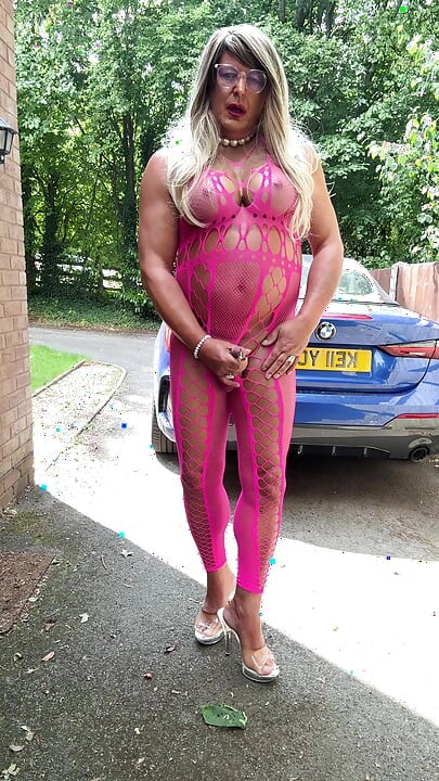 Sexy Crossdresser Kellycd2022's in pink fishnet catsuit and heels