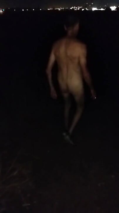 Naked Walking on the Hill Along Highway