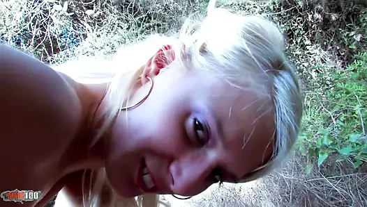 Sexy blonde giving her ass on the beach