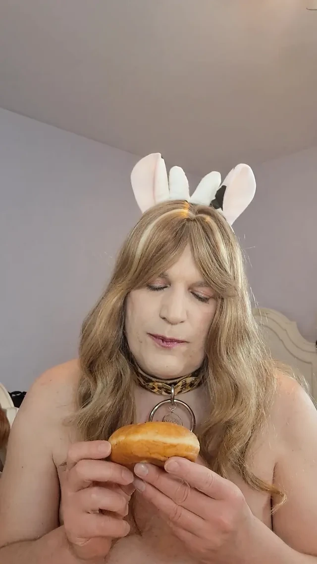 Sticking my tounge in a creamy chocolate doughnut