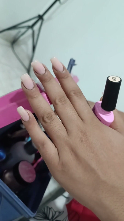 My wife does her nails while I put my penis on her back | Clip 1