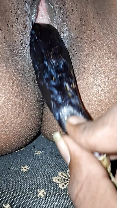Desi girl masturbates with eggplant and moans loudly