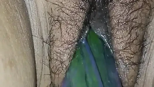 Indian desi sister-in-law with cucumber