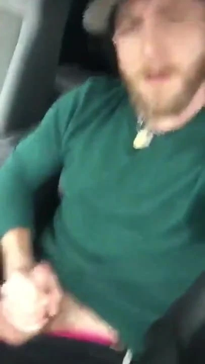 bearded hot guy shoots a load in his car