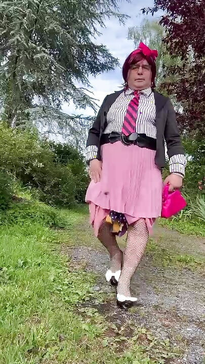 Dressed in a little pink pleated skirt for an evening out