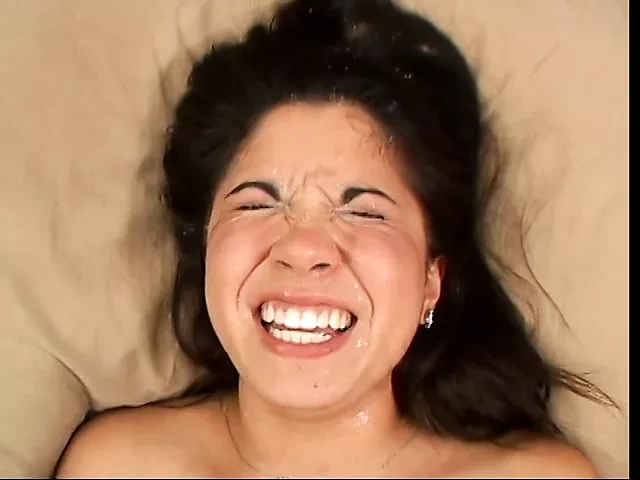 Young brunette with saggy tits chokes on fat cock