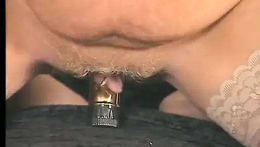 Blonde gilf wearing stockings while dildoing pussy