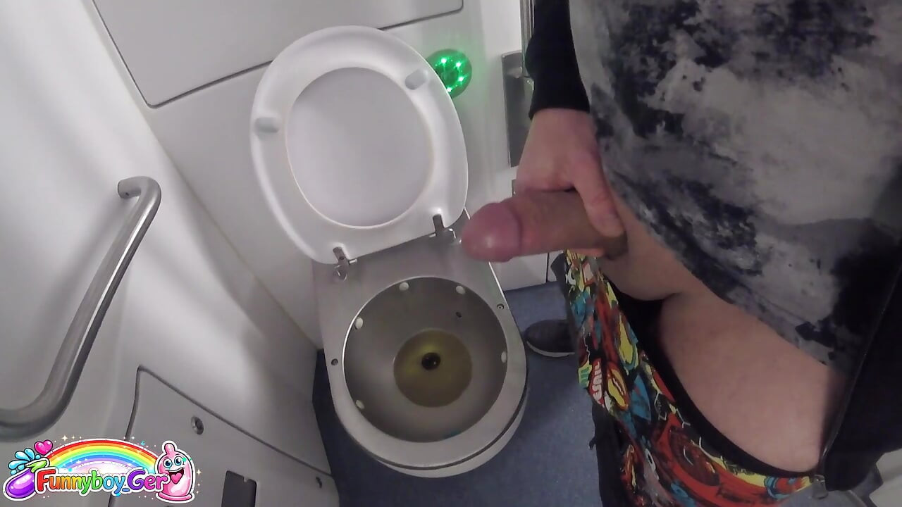 I peed in the toilet on the moving train and then jerked off my thick cock in sexy underwear. I was about to come, but then....