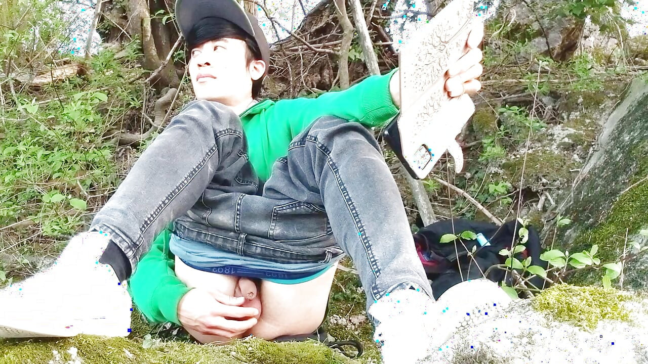 Risky masturbation outdoors a man's voice caught this cute gay twink with his balls hanging out, jerking off his uncut foreskin