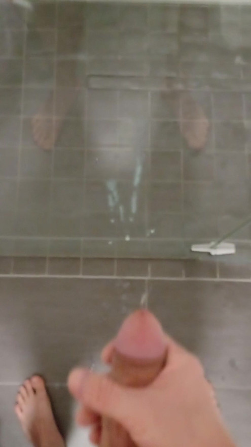 Messy Cumshot on a glass door