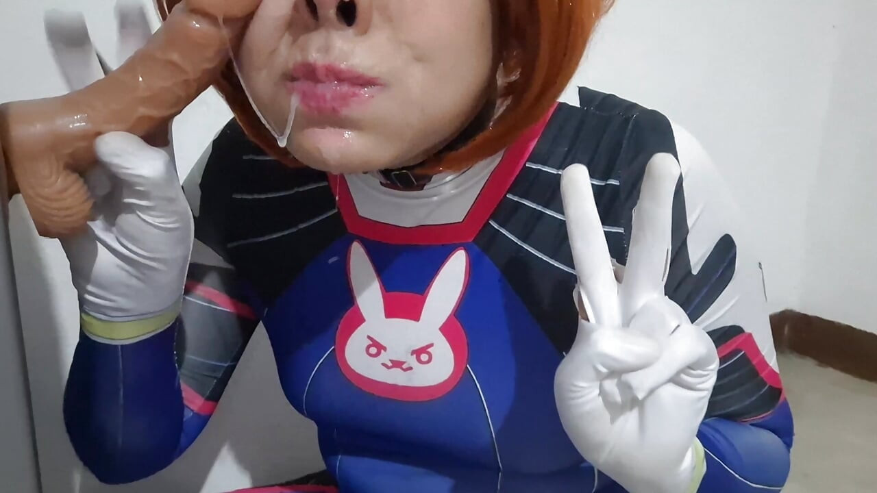 Femboy with Dva Cosplay and BDSM Nosehook Giving a Blowjob, Eating Cum and Deepthroat to Big Dildo