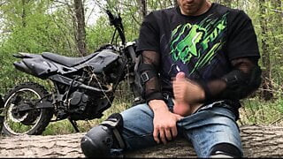 Handsome BIKER while riding a MOTORCYCLE in the forest JERKS OFF and CUMS in public