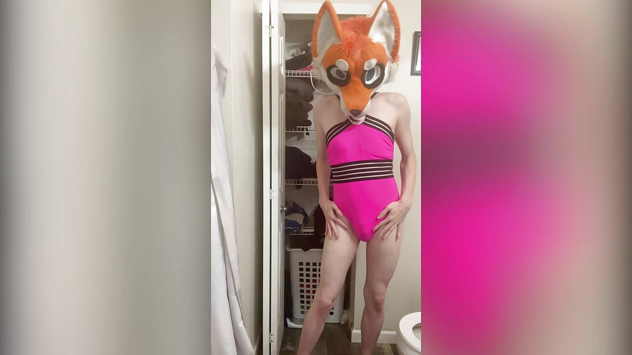 Foxxo Stripteases in Pink Swimsuit.mp4