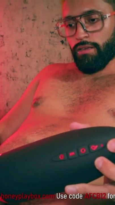 Stunning moment from "Big Cock Latino Camilo Brown Testing Honeyplaybox Dayo Vibrating, Heating and Clamping Masturbator"
