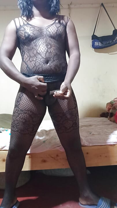 Fat ass crossdresser stroking his black dick until he cums