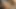 Slender shemale in white fishnets gets her face fucked on couch