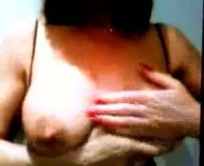 Anne Plays with HerBig Fake Tits