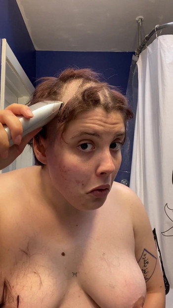 Iconic moment from "Hairless Whore - Adama Daat Amateur Fetish Head and Brow Shave"